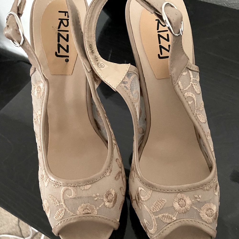 Amazing nude lace pumps with platforms. Barely used. Made in Italy